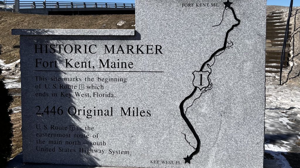 Historic marker in Fort Kent, Maine, detailing the beginning of U.S. Route 1, which ends in Key West, Florida, with a distance of 2,446 miles.
